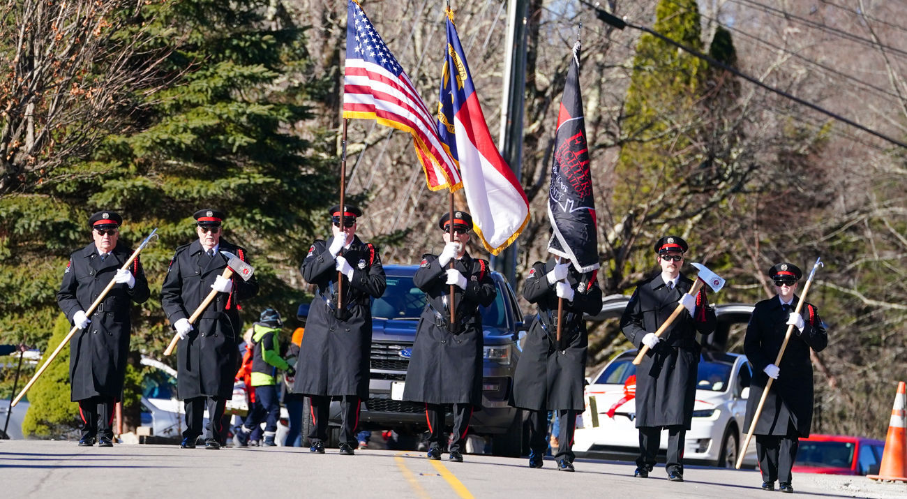 Firemen lead parade